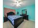 Bedroom with a double bed and dresser at 817 Linnaen Nw Ter, Port Charlotte, FL 33948