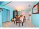 Elegant dining room with dark wood table and hutch at 817 Linnaen Nw Ter, Port Charlotte, FL 33948