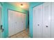 Bright hallway with double door closets at 817 Linnaen Nw Ter, Port Charlotte, FL 33948