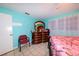 Bedroom with king-size bed and matching dresser at 817 Linnaen Nw Ter, Port Charlotte, FL 33948