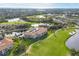 Aerial view of condo community near golf course and lake at 9630 Club South Cir # 6207, Sarasota, FL 34238