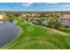 Golf course with pond and cart path at 9630 Club South Cir # 6207, Sarasota, FL 34238