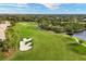 Golf course with sand traps and cart path at 9630 Club South Cir # 6207, Sarasota, FL 34238