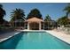 Inviting community swimming pool with adjacent lounge chairs at 9630 Club South Cir # 6207, Sarasota, FL 34238