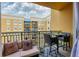 Private balcony with seating, perfect for relaxing and enjoying the view at 1064 N Tamiami Trl # 1504, Sarasota, FL 34236