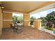 Spacious balcony overlooks lush landscaping and pool at 1064 N Tamiami Trl # 1504, Sarasota, FL 34236