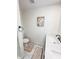 Clean bathroom with double vanity and updated fixtures at 1109 Harbor Blvd, Port Charlotte, FL 33952