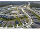 Aerial view of Riverfield community, showcasing numerous homes and lakes at 11771 Richmond Trl, Parrish, FL 34219