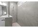 Large walk-in shower with grey tile and glass enclosure at 11771 Richmond Trl, Parrish, FL 34219