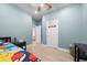 bedroom with Pokemon bedding and a basketball hoop at 11771 Richmond Trl, Parrish, FL 34219