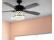 Modern ceiling fan with crystal accents at 11771 Richmond Trl, Parrish, FL 34219