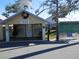 Community building with festive decor and a bell tower at 12 Desoto E St, Bradenton, FL 34208