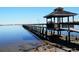 Long pier with gazebo extending into calm water at 12 Desoto E St, Bradenton, FL 34208