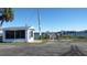 Community boat dock with small building and parking at 12 Desoto E St, Bradenton, FL 34208