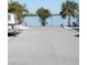 View of calm water with a fire hydrant and vegetation at 12 Desoto E St, Bradenton, FL 34208