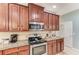 Modern kitchen with stainless steel appliances and granite countertops at 12219 23Rd E St, Parrish, FL 34219