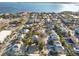 Aerial view of coastal neighborhood, showcasing various homes at 128 51St St # A, Holmes Beach, FL 34217