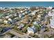 Aerial view of houses near beach, showing location and neighborhood at 128 51St St # A, Holmes Beach, FL 34217