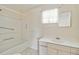 Clean bathroom with shower/tub combo and vanity at 128 51St St # A, Holmes Beach, FL 34217