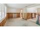 A room undergoing renovation, showcasing exposed walls and flooring at 128 51St St # A, Holmes Beach, FL 34217