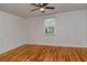 Bright bedroom with hardwood floors and ceiling fan at 1330 Cocoanut Ave, Sarasota, FL 34236