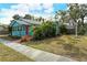 Cute light blue house with palm trees and yard at 1330 Cocoanut Ave, Sarasota, FL 34236