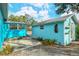 View of a light blue guest house and adjacent building at 1330 Cocoanut Ave, Sarasota, FL 34236