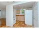 Small kitchen with light cabinets and tile floor at 1330 Cocoanut Ave, Sarasota, FL 34236