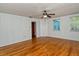 Bright living room with hardwood floors and ceiling fan at 1330 Cocoanut Ave, Sarasota, FL 34236