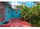 Quaint red patio and walkway next to house at 1330 Cocoanut Ave, Sarasota, FL 34236