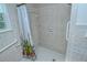 Walk-in shower with tiled walls at 1330 Cocoanut Ave, Sarasota, FL 34236