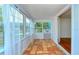 Bright sunroom with terracotta tile floor at 1330 Cocoanut Ave, Sarasota, FL 34236