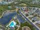 Aerial view showing home location in a community by a lake at 1479 Blue Horizon Cir, Bradenton, FL 34208