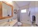 Bathroom with tub, shower, and updated vanity at 1479 Blue Horizon Cir, Bradenton, FL 34208