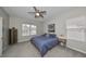 Comfortable bedroom with window and ceiling fan at 1479 Blue Horizon Cir, Bradenton, FL 34208