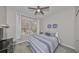 Cozy bedroom with a queen-size bed and window at 1479 Blue Horizon Cir, Bradenton, FL 34208