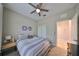 Serene bedroom with a queen bed and window at 1479 Blue Horizon Cir, Bradenton, FL 34208