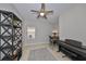 Bright home office features built-in shelving and plenty of natural light at 1479 Blue Horizon Cir, Bradenton, FL 34208