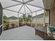 Enjoy the outdoors in this screened lanai with comfy seating at 1479 Blue Horizon Cir, Bradenton, FL 34208