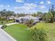 Aerial view of a single-Gathering home with a well-manicured lawn at 1604 21St W Ave, Palmetto, FL 34221