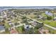 Wide aerial view showcasing the neighborhood and surrounding waterways at 1604 21St W Ave, Palmetto, FL 34221