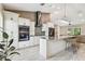 Modern kitchen with white cabinets and large island at 1604 21St W Ave, Palmetto, FL 34221