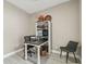 Home office with a desk, chair, and built-in shelving at 1604 21St W Ave, Palmetto, FL 34221