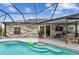 Inviting pool with a screened enclosure and patio at 1604 21St W Ave, Palmetto, FL 34221