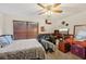 Spacious bedroom with a king-size bed and plenty of room for additional furniture at 1702 Spoonbill Dr, Nokomis, FL 34275