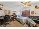 Bedroom with a double bed, desk, and ample space for studying or working at 1702 Spoonbill Dr, Nokomis, FL 34275