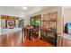 Casual dining area with wood floors at 1702 Spoonbill Dr, Nokomis, FL 34275