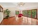 Sunlit Gathering room with sliding glass doors at 1702 Spoonbill Dr, Nokomis, FL 34275