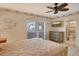 Comfortable bedroom with ensuite bathroom and built-in dresser at 1783 Lake Pl # 1783B, Venice, FL 34293