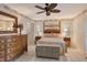 Main bedroom with bamboo bed frame and ample closet space at 1783 Lake Pl # 1783B, Venice, FL 34293